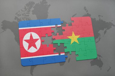Kuzey Kore ve burkina faso ulusal bayrak bir dünya haritası üzerinde ile bulmaca