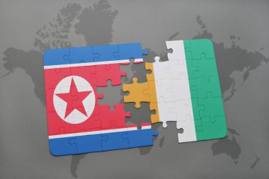 Kuzey Kore ve Fildişi Sahili bir dünya haritası üzerinde bayrağı ile bulmaca