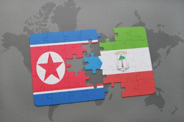 Kuzey Kore ve Ekvator Ginesi ulusal bayrak bir dünya haritası üzerinde ile bulmaca