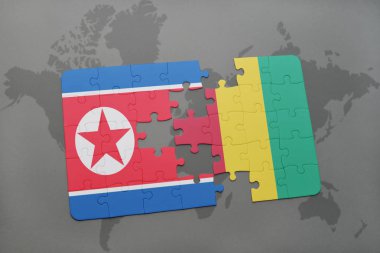Kuzey Kore ve bir dünya haritası üzerinde Gine bayrağı ile bulmaca