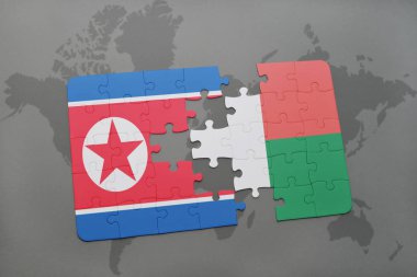 Kuzey Kore ve Madagaskar ulusal bayrak bir dünya haritası üzerinde ile bulmaca