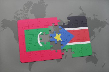 Maldivler ve bir dünya haritası üzerinde Güney sudan bayrağı ile bulmaca