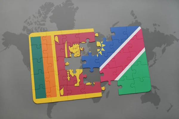 Puzzel met de nationale vlag van sri lanka en Namibië op een wereldkaart — Stockfoto