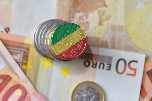 Euro coin with national flag of republic of the congo on the euro money banknotes background. — Stock Photo, Image