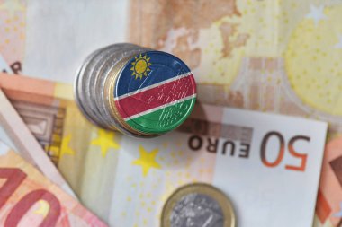 Euro madeni para ile Namibya ulusal bayrak euro para banknot arka plan üzerinde.