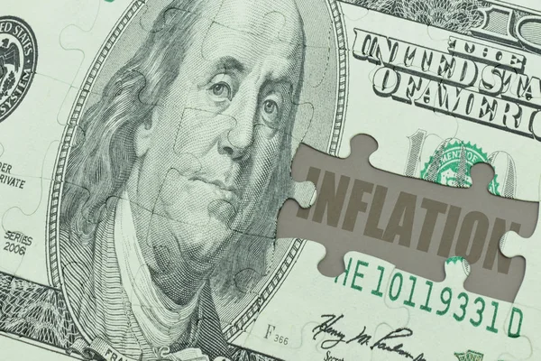 Puzzle mit der Dollarnote und der Textinflation. — Stockfoto