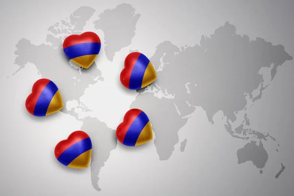 世界地図背景にアルメニアの国旗と 5 つの心. — ストック写真