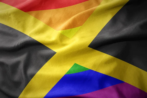 Waving jamaica rainbow gay pride flag banner — Stock Photo, Image