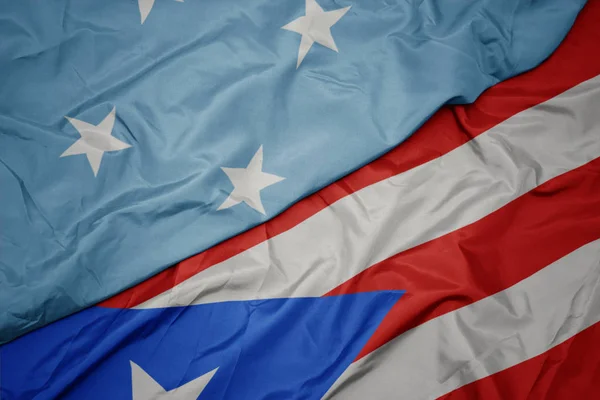 Waving colorful flag of puerto rico and national flag of Federated States of Micronesia . — Stock Photo, Image