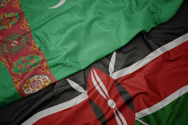 Κυματίζει πολύχρωμη σημαία του kenya και εθνική σημαία του Τουρκμενιστάν. — Φωτογραφία Αρχείου