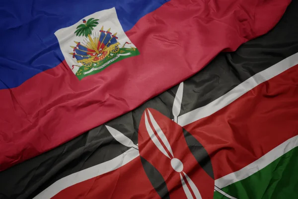Κυματίζει πολύχρωμη σημαία της kenya και την εθνική σημαία της Αϊτής. — Φωτογραφία Αρχείου