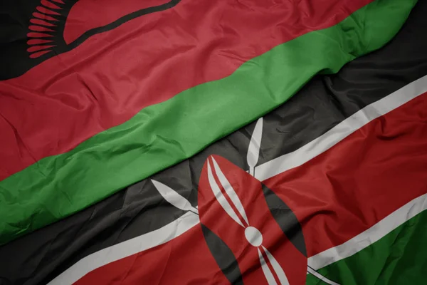 Viftande färgglada flagga kenya och nationell flagga malawi. — Stockfoto