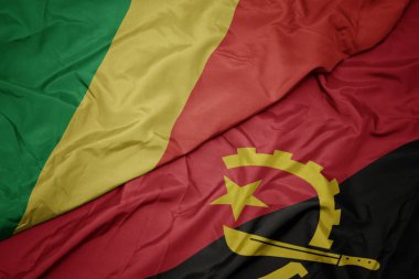 Angola 'nın renkli bayrağı ve Kongo Cumhuriyeti' nin ulusal bayrağı sallanıyor..