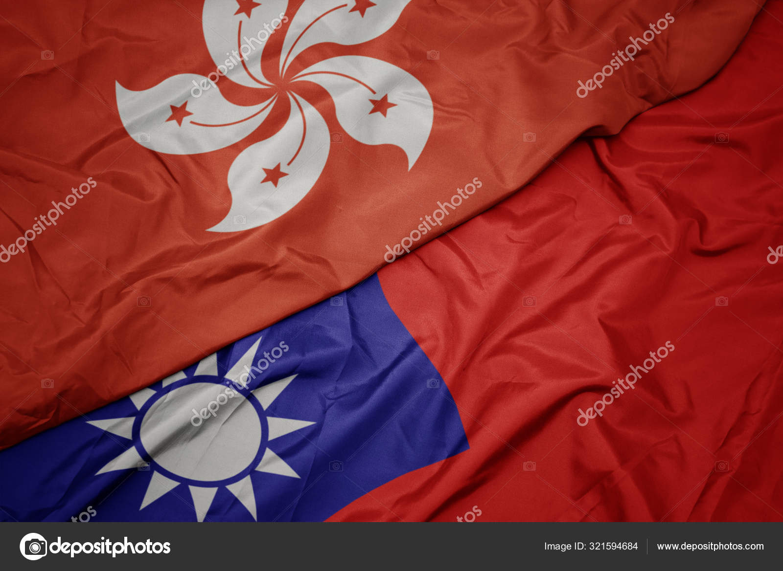 挥动着台湾五彩缤纷的国旗和香港国旗 图库照片 C Ruletkka