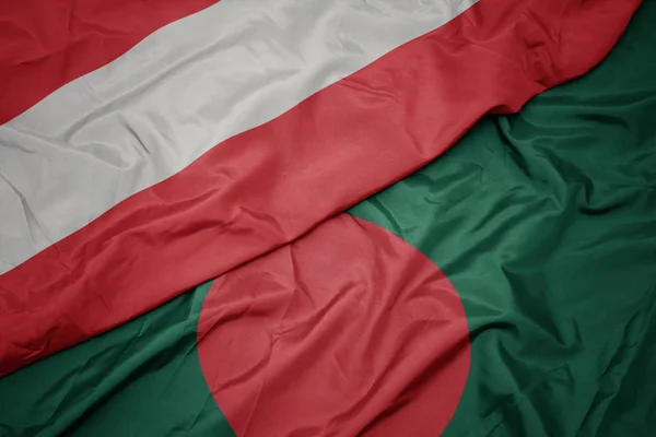 Sventolando bandiera colorata del bangladesh e bandiera nazionale dell'austria . — Foto Stock