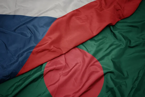 Sventolando bandiera colorata del bangladesh e bandiera nazionale della repubblica ceca . — Foto Stock