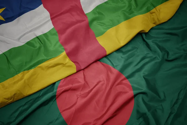 Acenando bandeira colorida de bangladesh e bandeira nacional da república centro-africana . — Fotografia de Stock