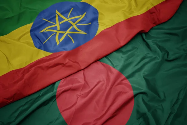 Machanie kolorową flagą Bangladeszu i narodową flagą Etiopii . — Zdjęcie stockowe