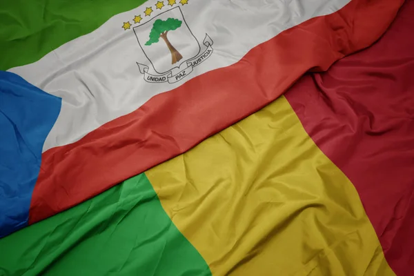Ondeando colorida bandera de Malí y bandera nacional de Guinea Ecuatorial . —  Fotos de Stock