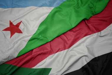 Sudan 'ın renkli bayrağı ve Cibuti' nin ulusal bayrağı sallanıyor..