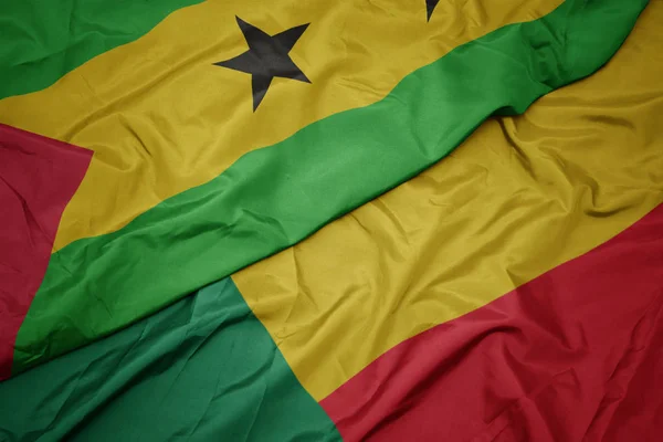 Waving colorful flag of benin and national flag of sao tome and principe . — Stock Photo, Image