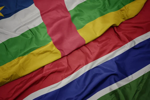 Acenando bandeira colorida de gâmbia e bandeira nacional da república centro-africana . — Fotografia de Stock