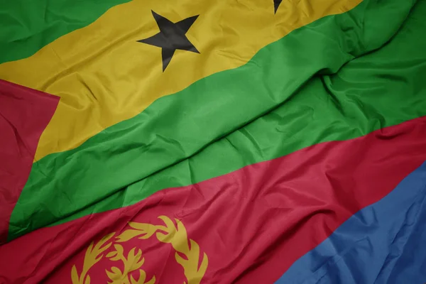 Ondeando colorida bandera de eritrea y bandera nacional de sao tome y principe  . —  Fotos de Stock