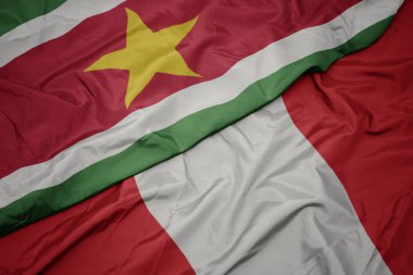 Peru 'nun renkli bayrağı ve Surinam' ın ulusal bayrağı sallanıyor.
