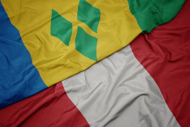 Peru 'nun renkli bayrağını sallayan Saint Vincent ve El bombaları' nın ulusal bayrağını.