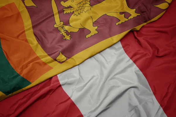 Acenando bandeira colorida de peru e bandeira nacional de sri lanka . — Fotografia de Stock