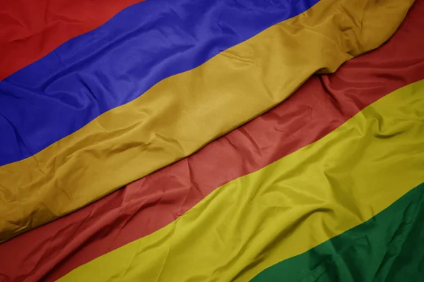 Machając Barwną Flagą Boliwii Narodową Flagą Armenii Makro — Zdjęcie stockowe