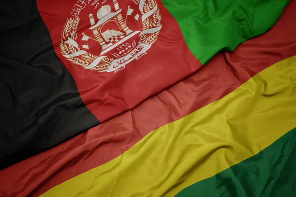 Machanie Kolorową Flagą Boliwii Flagą Narodową Afganistanu Makro — Zdjęcie stockowe