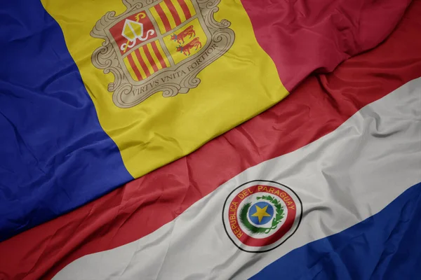 Размахивая Красочным Флагом Парагвая Национальным Флагом Андорры Macro — стоковое фото