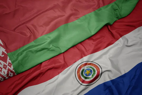 Színes Paraguay Zászlót Lobogtatva Belarus Nemzeti Zászlaját Lobogtatva Makroszintű — Stock Fotó