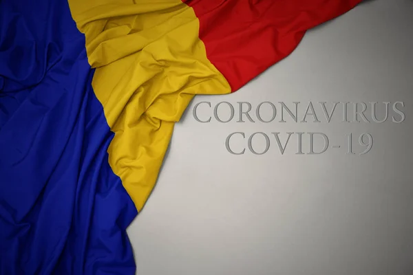 Ondeando Colorida Bandera Nacional Romania Sobre Fondo Gris Con Texto —  Fotos de Stock