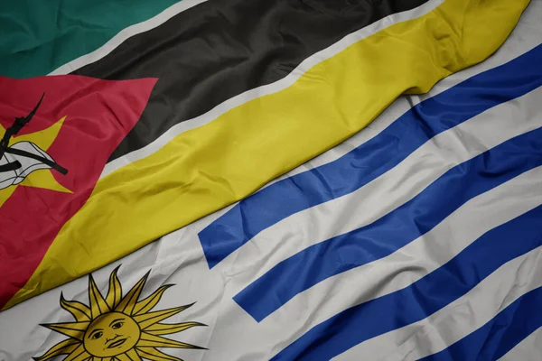 Mávání Barevnou Vlajkou Uruguay Národní Vlajky Mozambique Makro — Stock fotografie