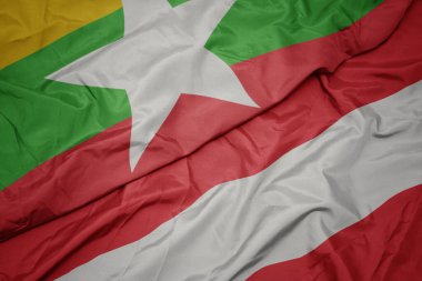 Avusturalya 'nın renkli bayrağı ve Myanmar' ın ulusal bayrağı sallanıyor. makro