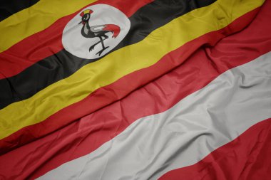 Renkli Avusturya bayrağı ve Uganda bayrağı sallıyordu. makro