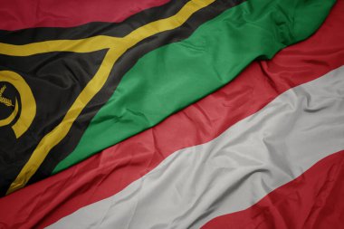 Renkli Avusturya bayrağı ve Vanuatu bayrağı sallıyordu. makro