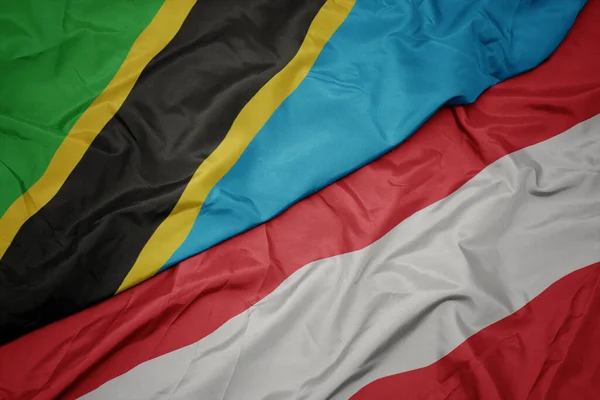 Ondeando Colorida Bandera Austria Bandera Nacional Tanzania Macro —  Fotos de Stock