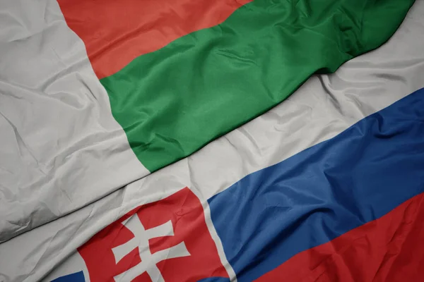 Acenando Bandeira Colorida Eslováquia Bandeira Nacional Madagascar Macro — Fotografia de Stock