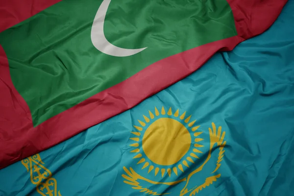 Acenando Bandeira Colorida Cazaquistão Bandeira Nacional Das Maldivas Macro — Fotografia de Stock