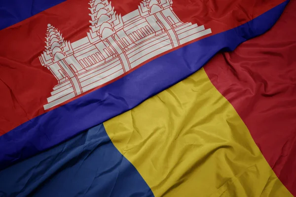 Размахивая Красочным Флагом Румынии Национальным Флагом Камбоджи Macro — стоковое фото