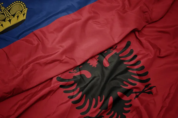 Albania Nın Renkli Bayrağı Lihtenştayn Ulusal Bayrağı Sallanıyor Makro — Stok fotoğraf