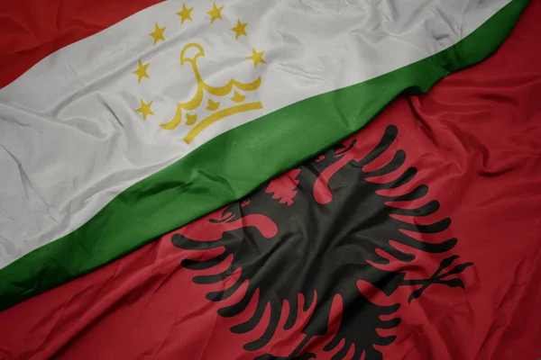 Albania Nın Renkli Bayrağı Tacikistan Ulusal Bayrağı Sallanıyor Makro — Stok fotoğraf