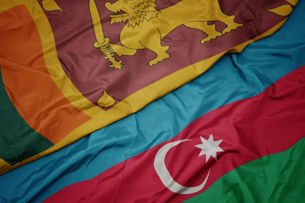 Azerbaijan 'ın renkli bayrağı ve Sri Lanka' nın ulusal bayrağı sallanıyor. makro