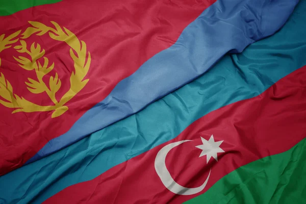 Azerbaijan 'ın renkli bayrağı ve eritrea' nın ulusal bayrağı sallanıyor. makro