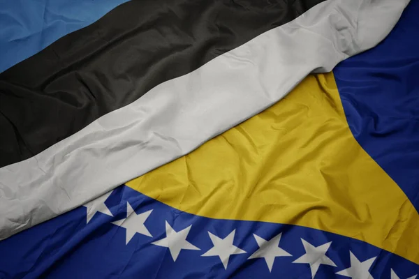 Waving Colorful Flag Bosnia Herzegovina National Flag Estonia Macro — Stock Photo, Image