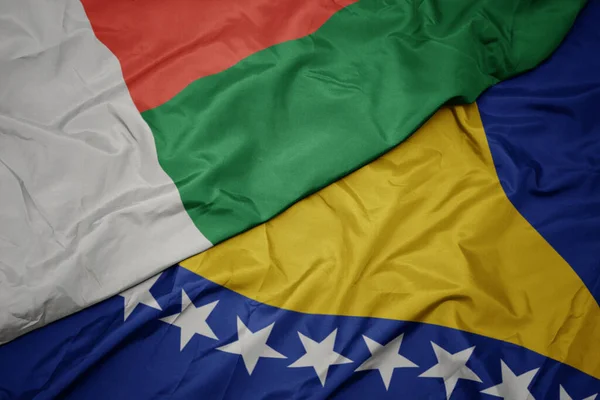 Színes Bosznia Herzegovina Zászlaját Lobogtatva Madagaszkár Nemzeti Zászlaját Lobogtatva Makroszintű — Stock Fotó