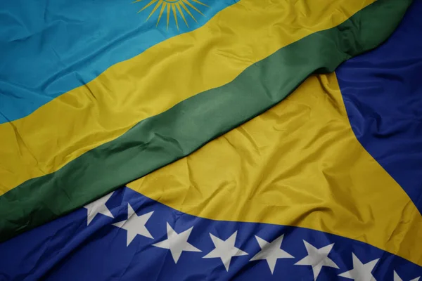 Színes Bosznia Herzegovina Zászlaját Lobogtatva Ruanda Nemzeti Zászlaját Lobogtatva Makroszintű — Stock Fotó